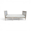 Tara Shaw 18th century Gustavian daybed with carved wood frame, aged patina, and light linen upholstered cushion.