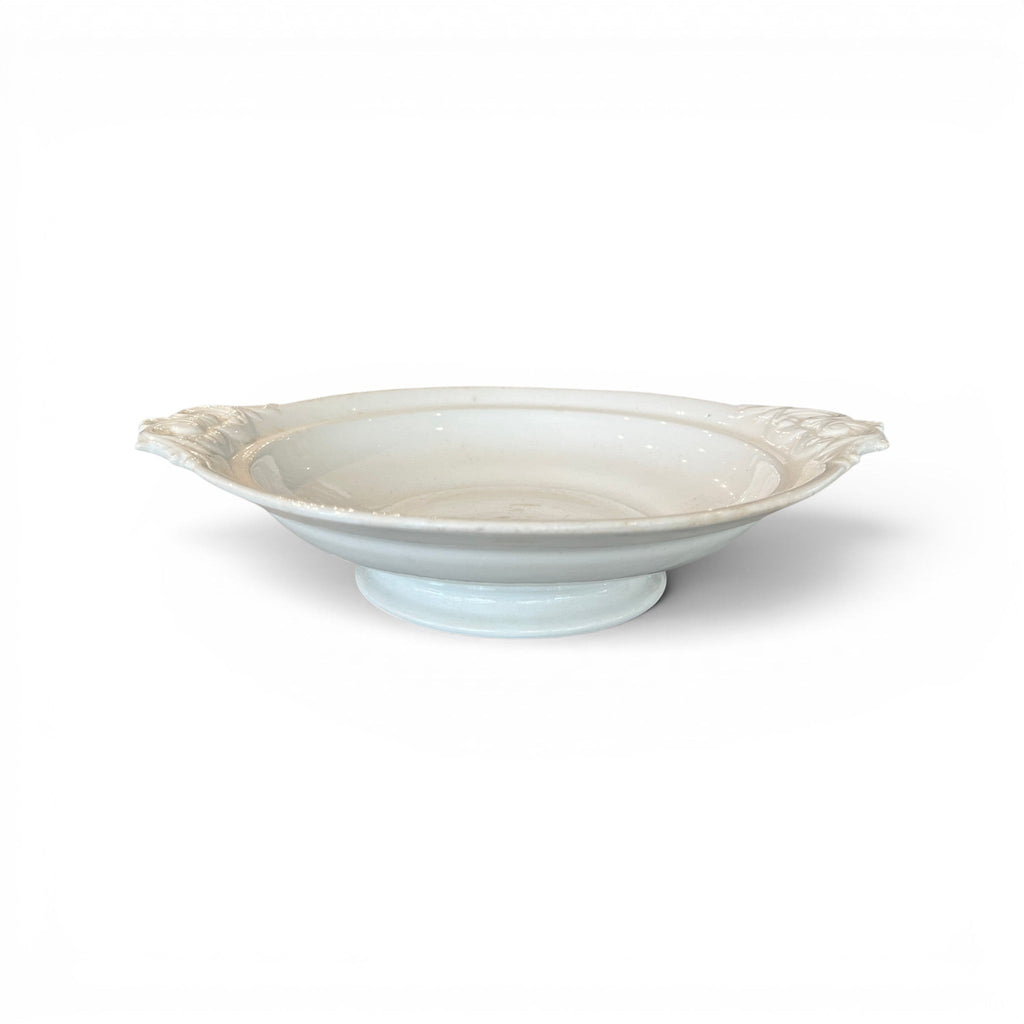 Tara Shaw 19th century European ironstone bowl with a white glazed finish and elegant side handles.