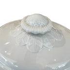 Tara Shaw 19th century white ironstone tureen lid featuring a detailed sunflower rose finial and glossy finish.