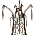 Tara Shaw 19th century Italian Empire chandelier with a giltwood and iron frame and hanging crystal basket accents.