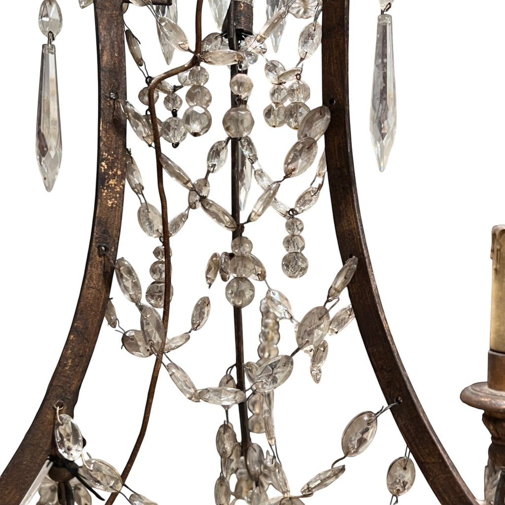 Tara Shaw 19th century Italian Empire chandelier with a giltwood and iron frame and cascading crystal basket details.