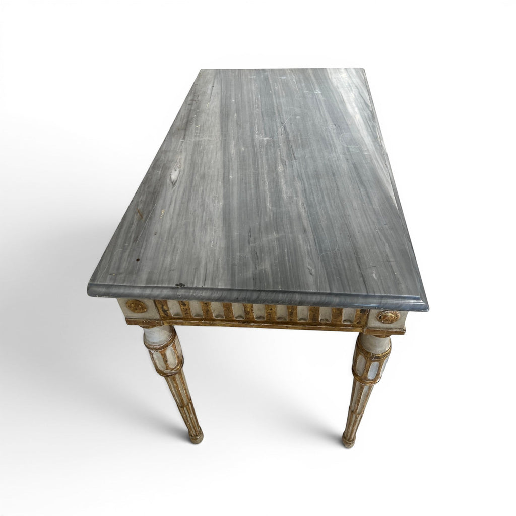 Tara Shaw 18th-century Italian Louis XVI console table with a grey marble top and neoclassical carved wooden legs.