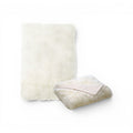 Tara Shaw ivory Tibetan lambskin throw with plush, organic texture and a soft, luxurious drape for home decor.