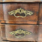 Tara Shaw 18th-century French Louis XV walnut commode featuring ornate original bronze hardware and aged wood patina.