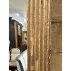 Tara Shaw 19th century French Louis XVI giltwood mirror frame with neoclassical fluted detailing and aged patina