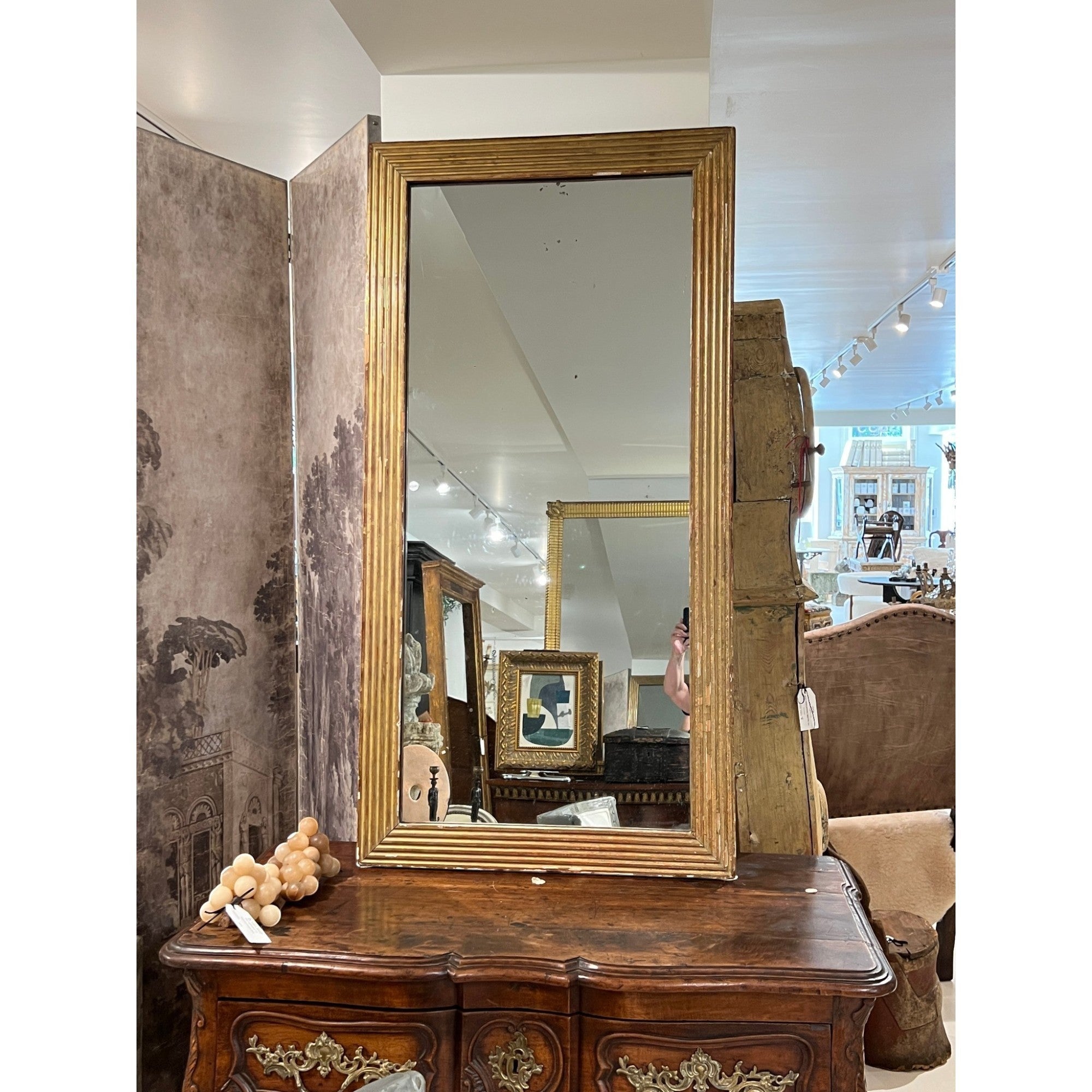 Tara Shaw 19th century French Louis XVI rectangular mirror with a finely carved, aged giltwood frame.