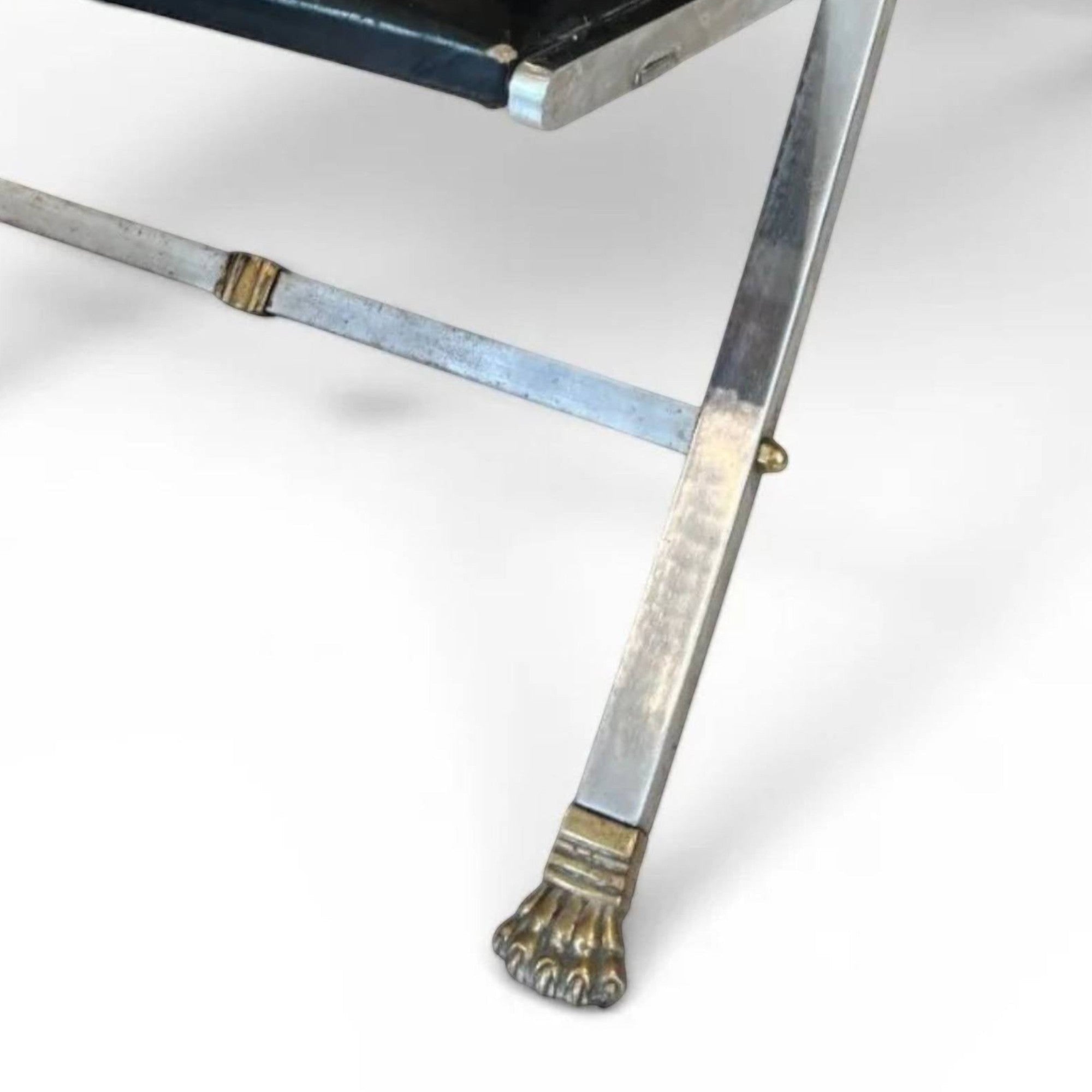 Tara Shaw vintage Maison Jansen folding chair with black leather seat and brass claw feet detail