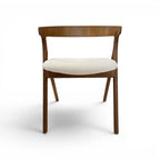 Tara Shaw mid-century Italian dining chair with a dark wood frame and cream-colored textured upholstered seat