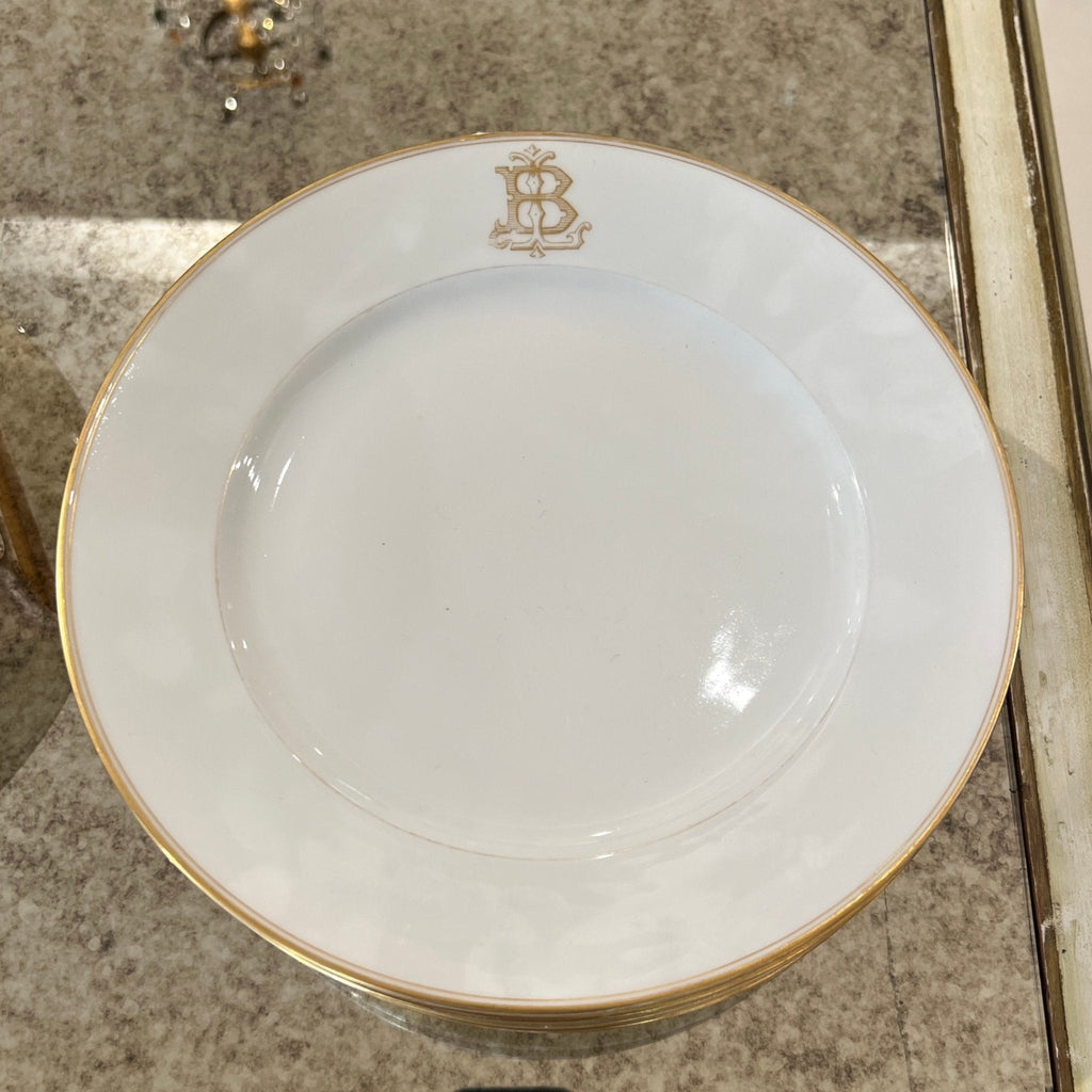 Tara Shaw white porcelain dinner plate with a gold rim and elegant monogrammed letter B in the center.
