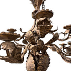Tara Shaw 18th century Piemontese tole chandelier with aged gold patina, floral metal leaves, and ornate candle cups.