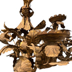 Tara Shaw 18th century Piemontese tole chandelier with aged gold patina, floral metalwork, and ornate candle cups.