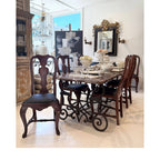 Tara Shaw set of six 18th-century Rococo dining chairs from Lucca with carved wooden frames and dark upholstered seats.