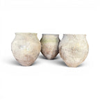 Tara Shaw set of three rustic 18th century Spanish pottery jars with weathered patina and unique handcrafted textures.