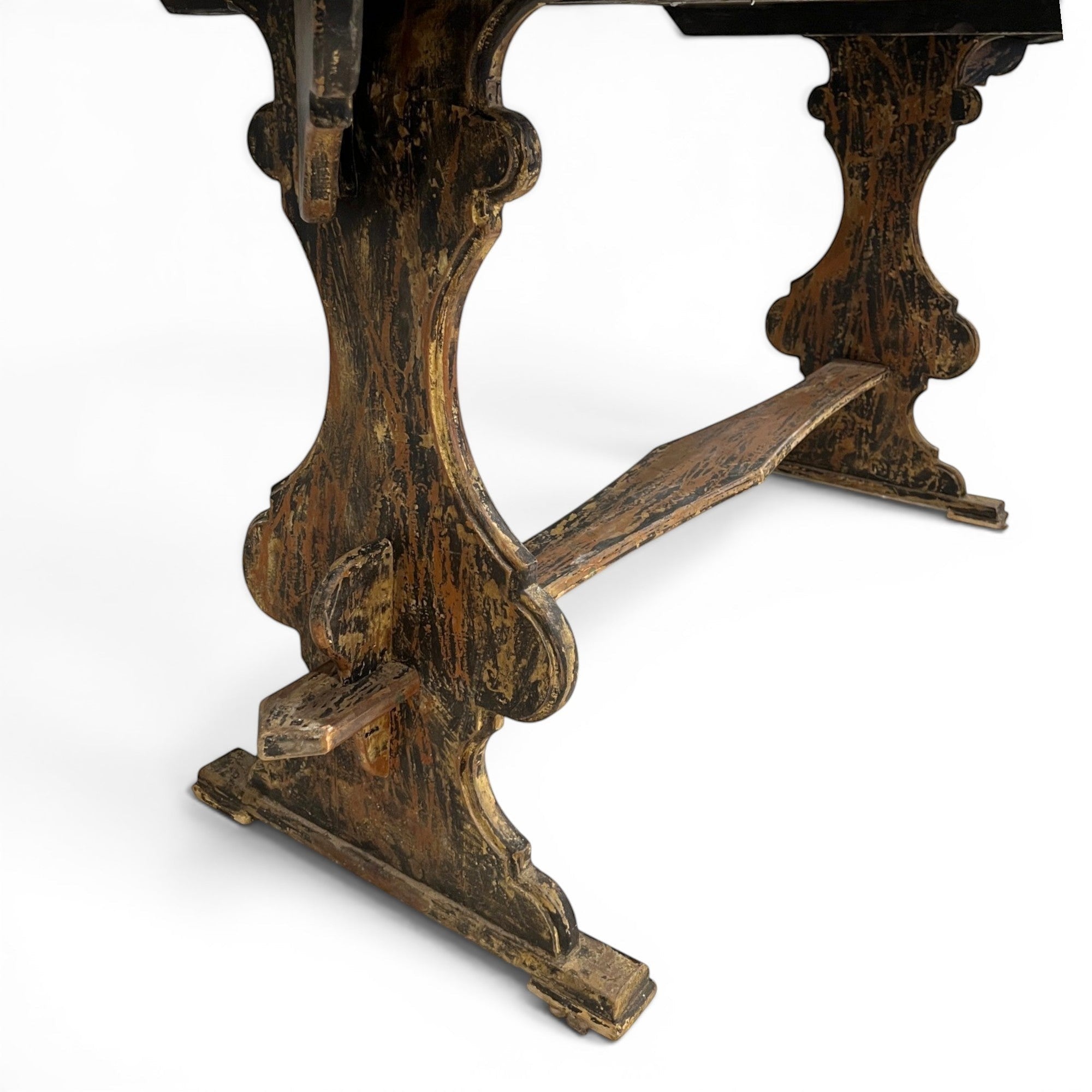 Tara Shaw 18th century Swedish drop leaf table with a weathered patina and ornate wooden trestle base