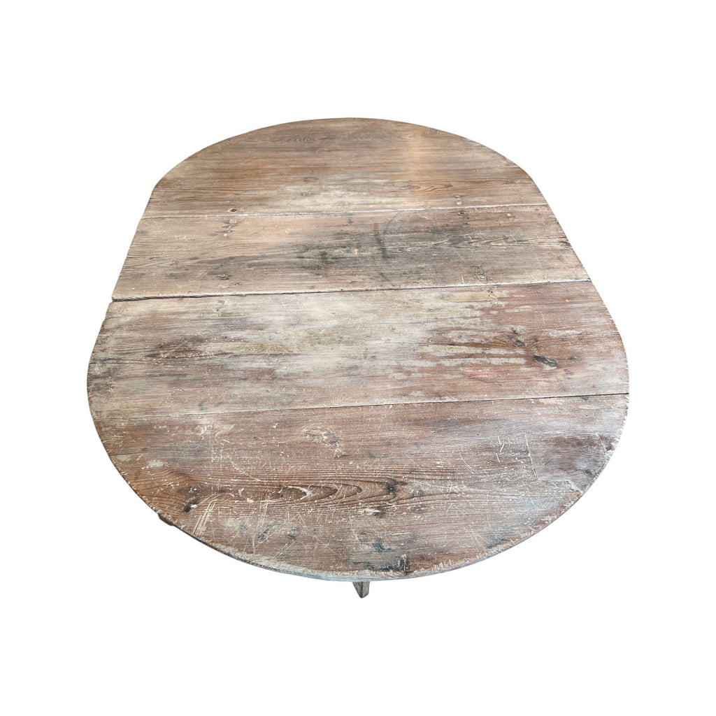 Tara Shaw 19th-century Swedish drop leaf table with a distressed grey painted finish and oval wooden top.