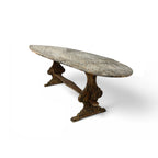 Tara Shaw 18th century Swedish drop leaf table with a weathered patina and ornate wooden trestle base