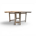 Tara Shaw 19th-century Swedish drop leaf table with a distressed grey painted finish and timeworn wooden patina.