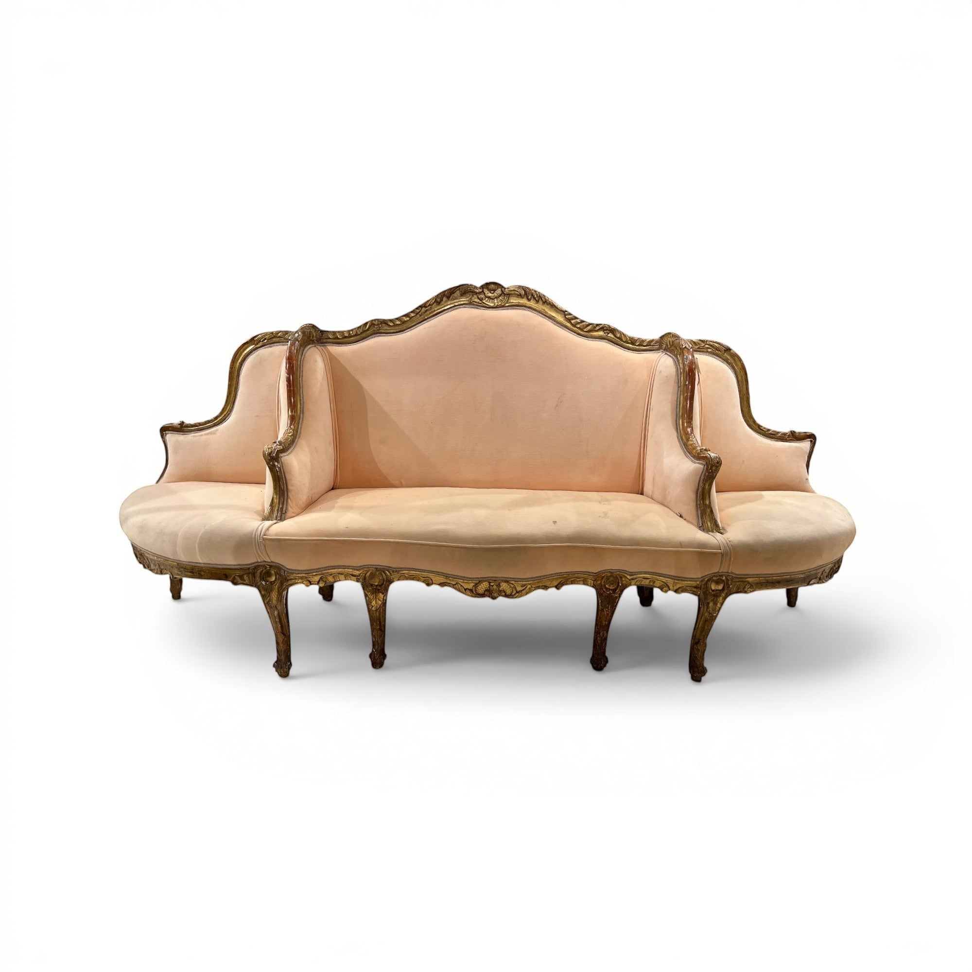 Tara Shaw 19th century Swedish three-seat banquette with a carved giltwood frame and pale pink upholstered seating.