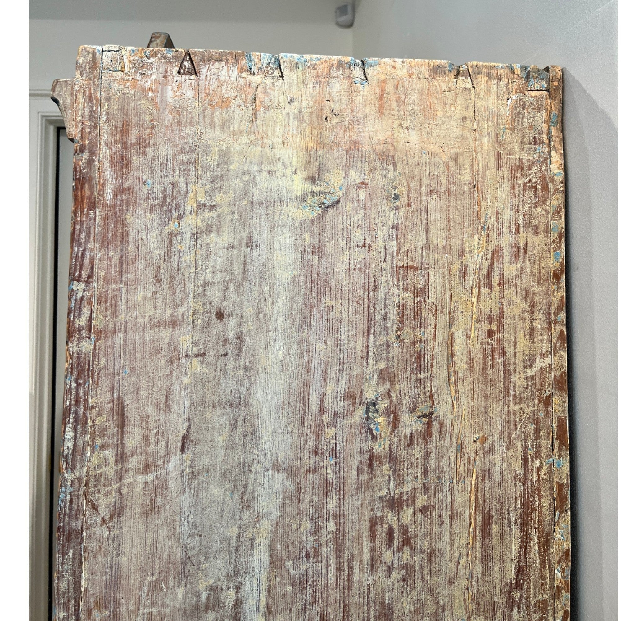 Tara Shaw 18th century Swedish Gustavian cabinet side panel showing aged wood patina and dovetail joinery details.
