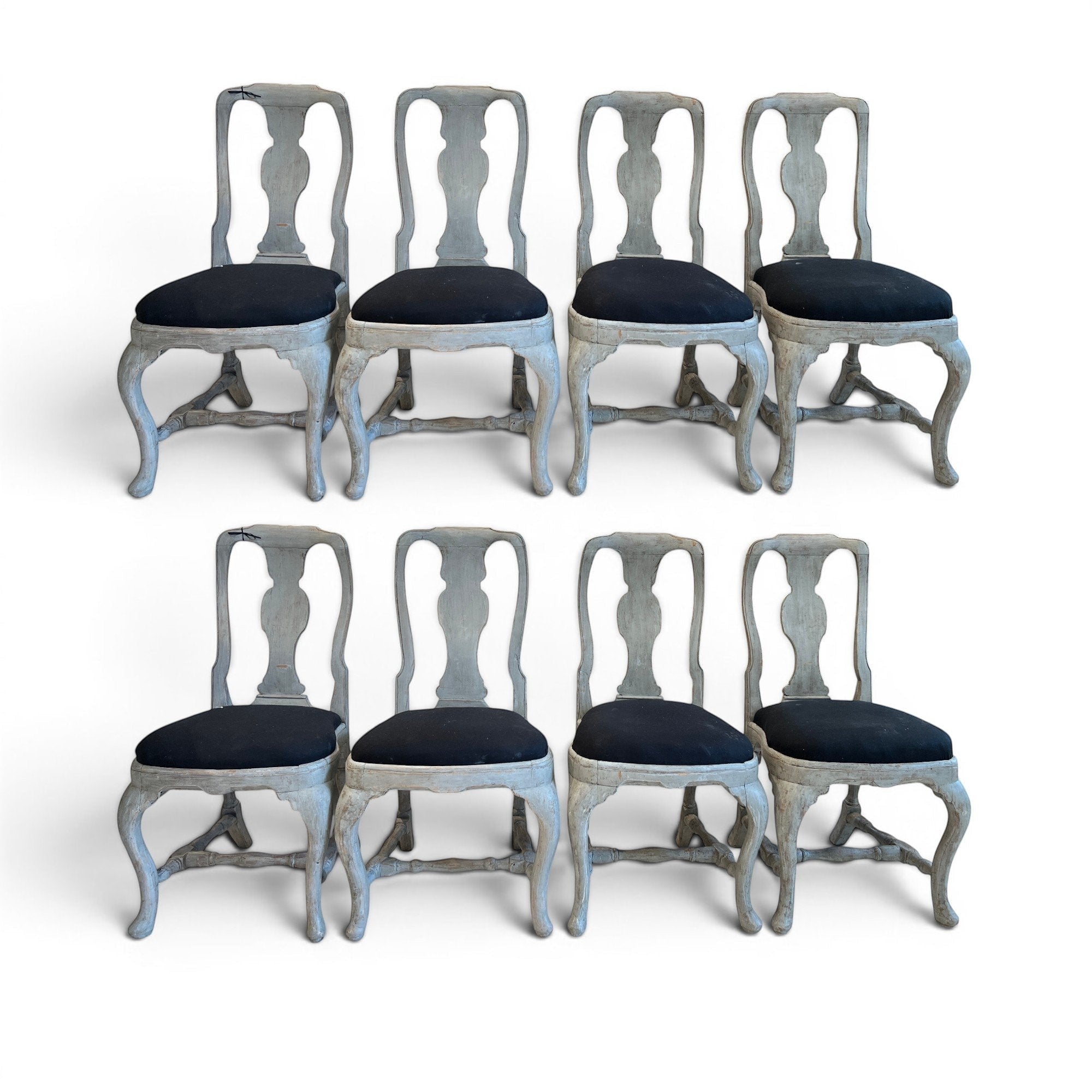 Tara Shaw set of eight 18th-century Swedish Rococo dining chairs with grey painted wood frames and black upholstered seats.