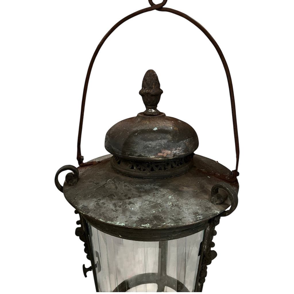 Tara Shaw 18th century Venetian bronze lantern with aged patina, glass panels, and a decorative arched handle.
