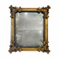Tara Shaw 18th-century style Venetian mirror with ornate gold carved frame and antique glass finish