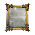 Tara Shaw 18th-century style Venetian mirror with ornate gold carved frame and antique glass finish