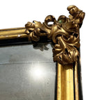 Tara Shaw 18th Century Venetian mirror with ornate gold carved corner detailing and antique glass finish