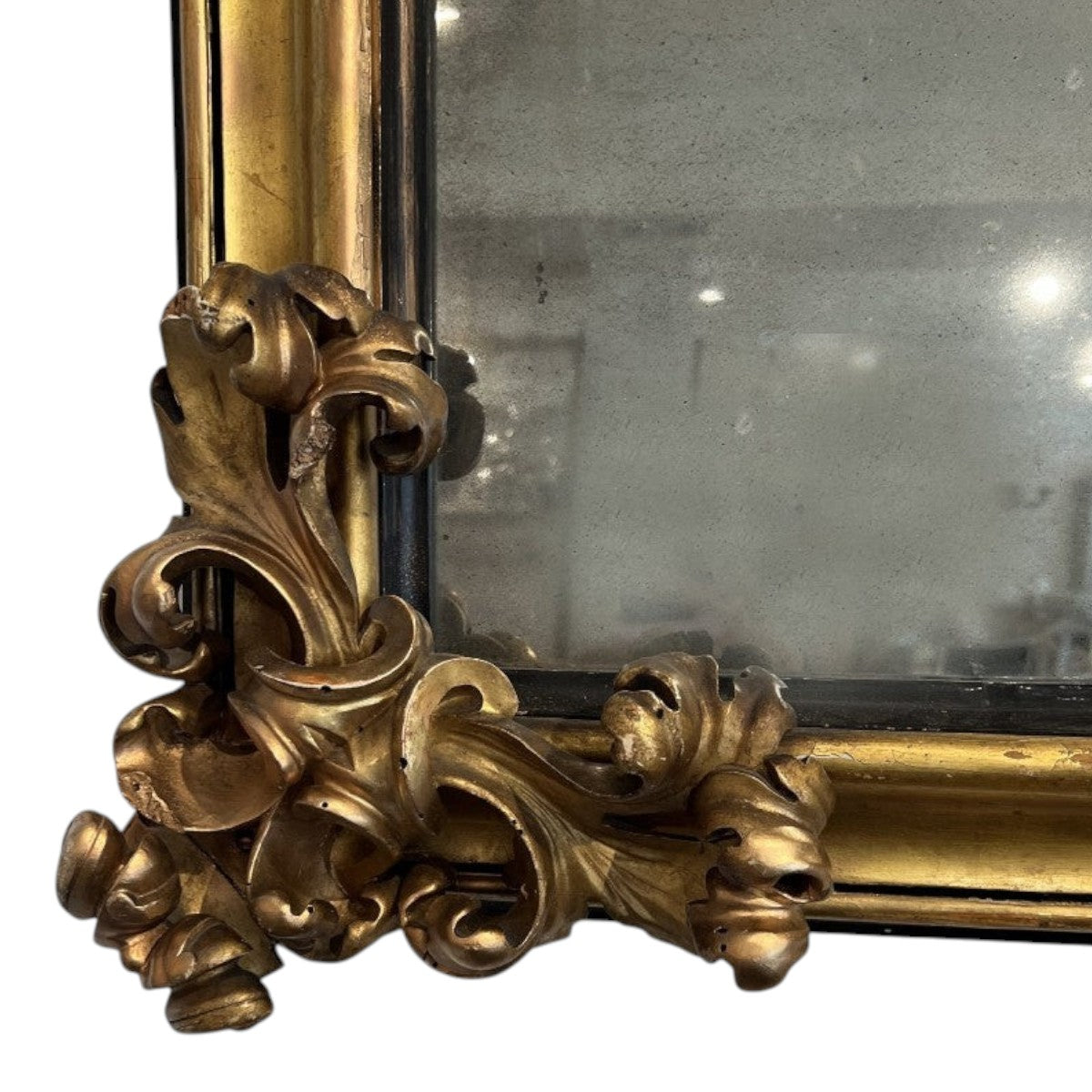 Tara Shaw 18th century Venetian mirror with ornate gold carved corner detailing and antique glass finish