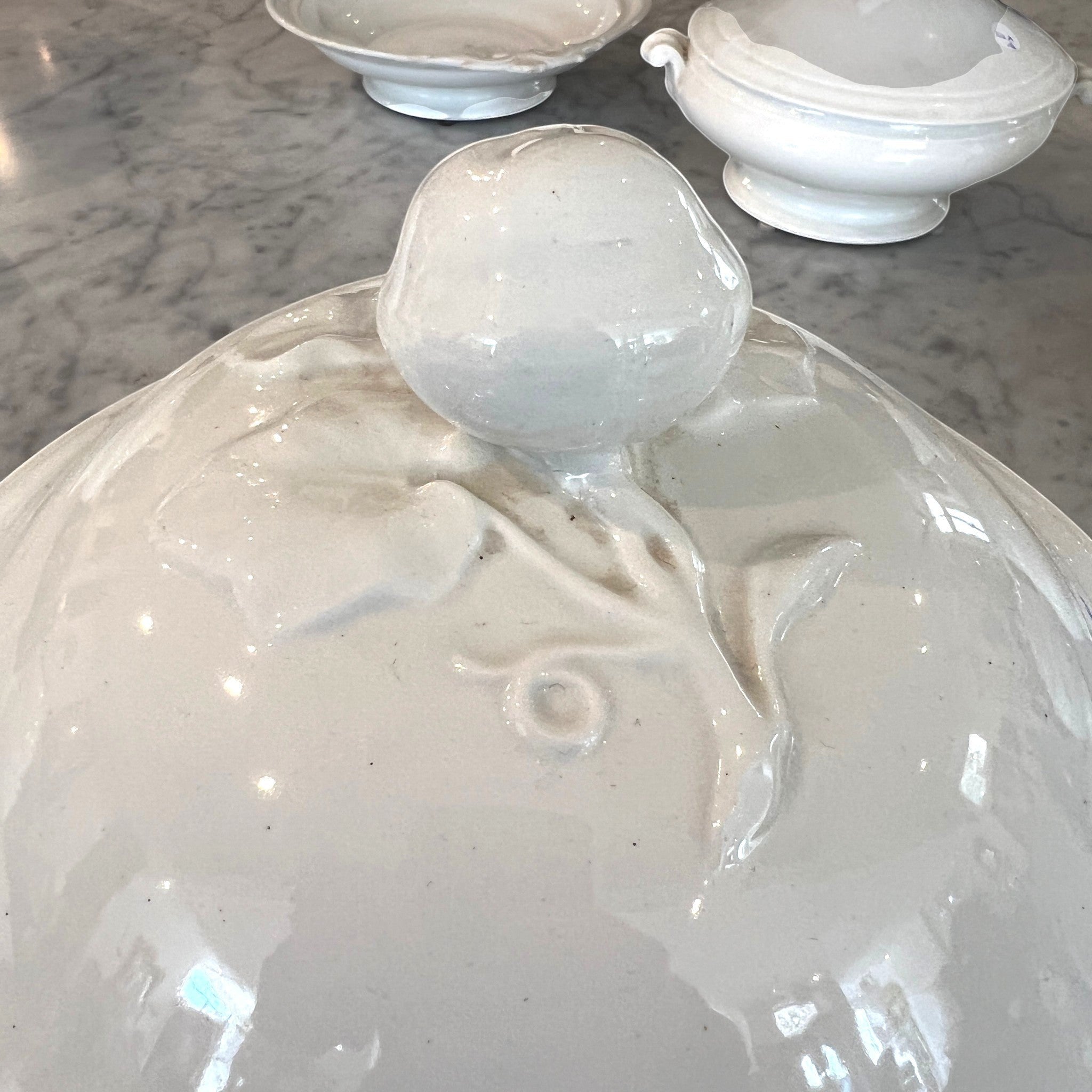 Tara Shaw 19th century white ironstone tureen lid featuring a sculpted rose finial and elegant glazed finish.
