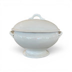 Tara Shaw 19th century European white ironstone tureen with lid featuring an elegant aged patina and pedestal base.