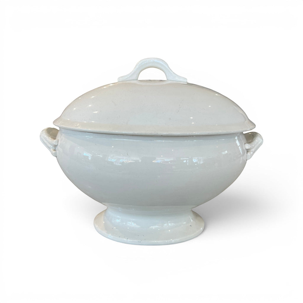 Tara Shaw 19th century European white ironstone tureen with lid featuring a classic pedestal base and elegant handles.