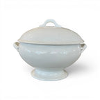 Tara Shaw 19th century European white ironstone tureen with lid featuring a classic pedestal base and elegant handles.